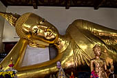 Thailand, reclined Buddha in one wiharn of the outer couryard of Phra Pathom Chedi, the nation's largest pagoda in Nakorn Pathom.